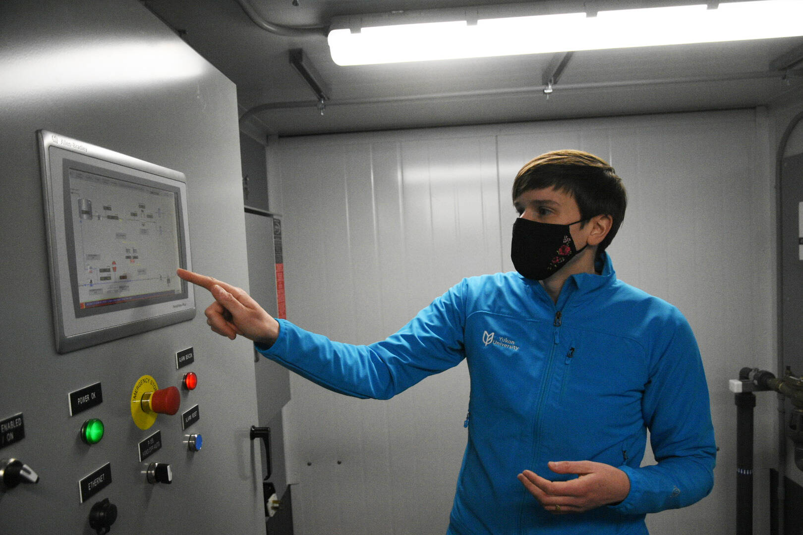 Alison Anderson explains the equipment in the mobile water treatment lab that Yukon University will be using to train new small water system operators. (Jim Elliot/Yukon News)