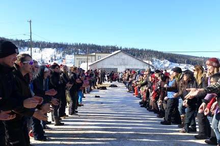 The egg toss event during Thaw Di Gras in Dawson has competitors coming up with strategies to help them stay in the game longer. (Andrea Magee/Submitted)