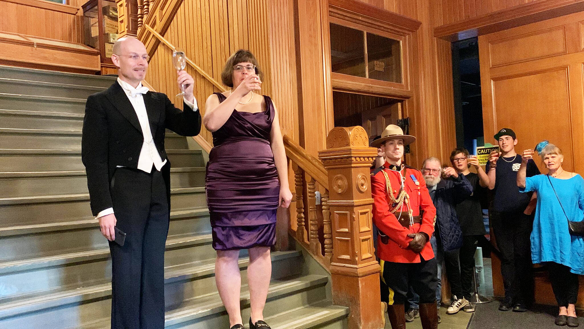 Former museum director Alex Somerville (L) and Commisioner Angélique Bernard (R) lead a toast to the Queen during a Jubilee celebration at the Dawson City Museum. (Courtesy/Office of the Commissioner)
