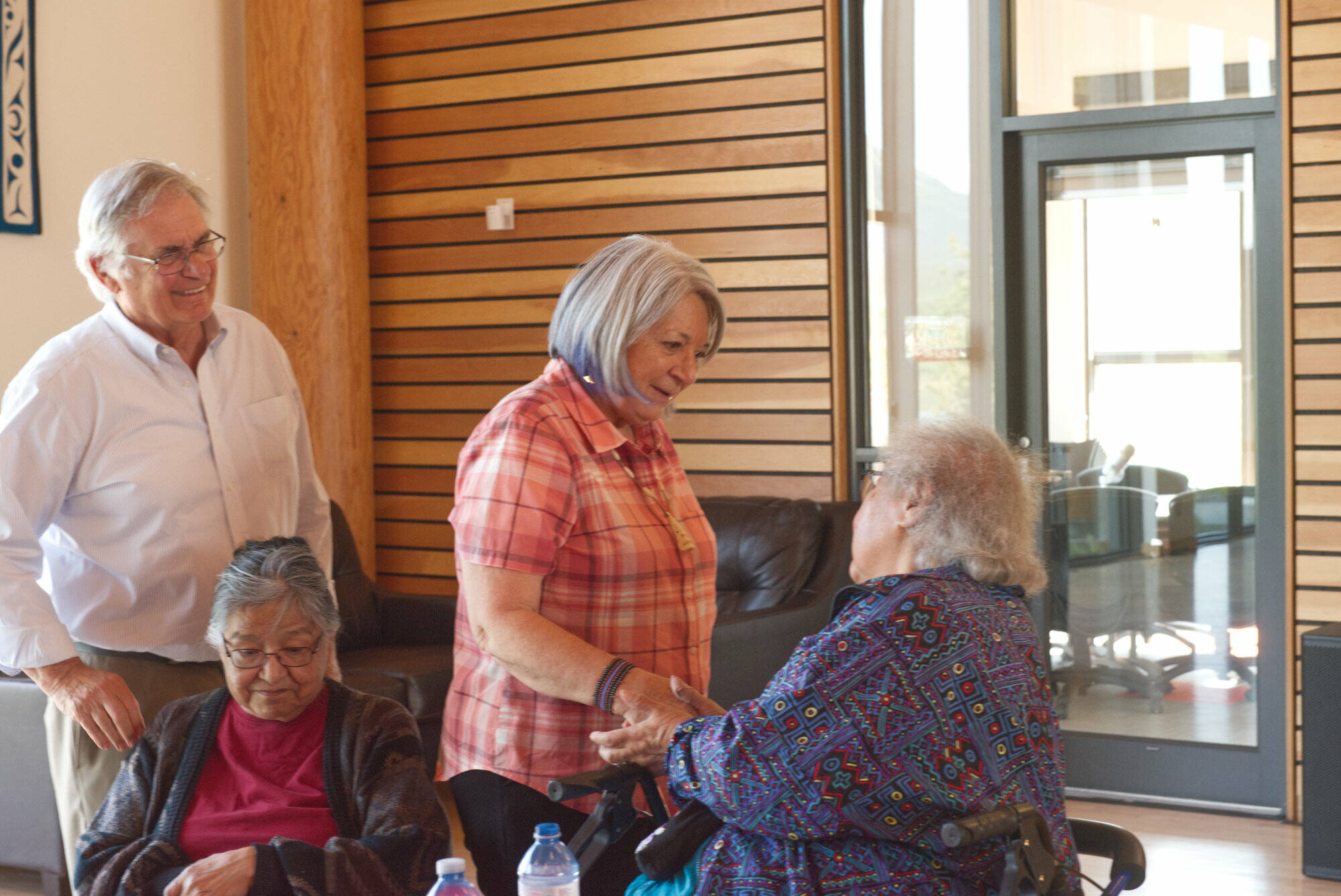 Governor General Mary Simon greets Carcross/Tagish First Nation elders during her visit to their cultural centre on Sunday, June 26. (Jim Elliot/Yukon News)