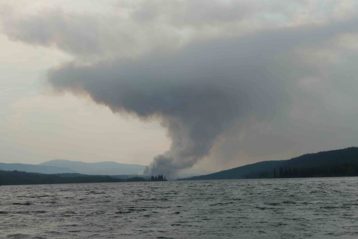 The Frances Lake fire spits up smoke into the sky. (Yukon Protective Services/Facebook)