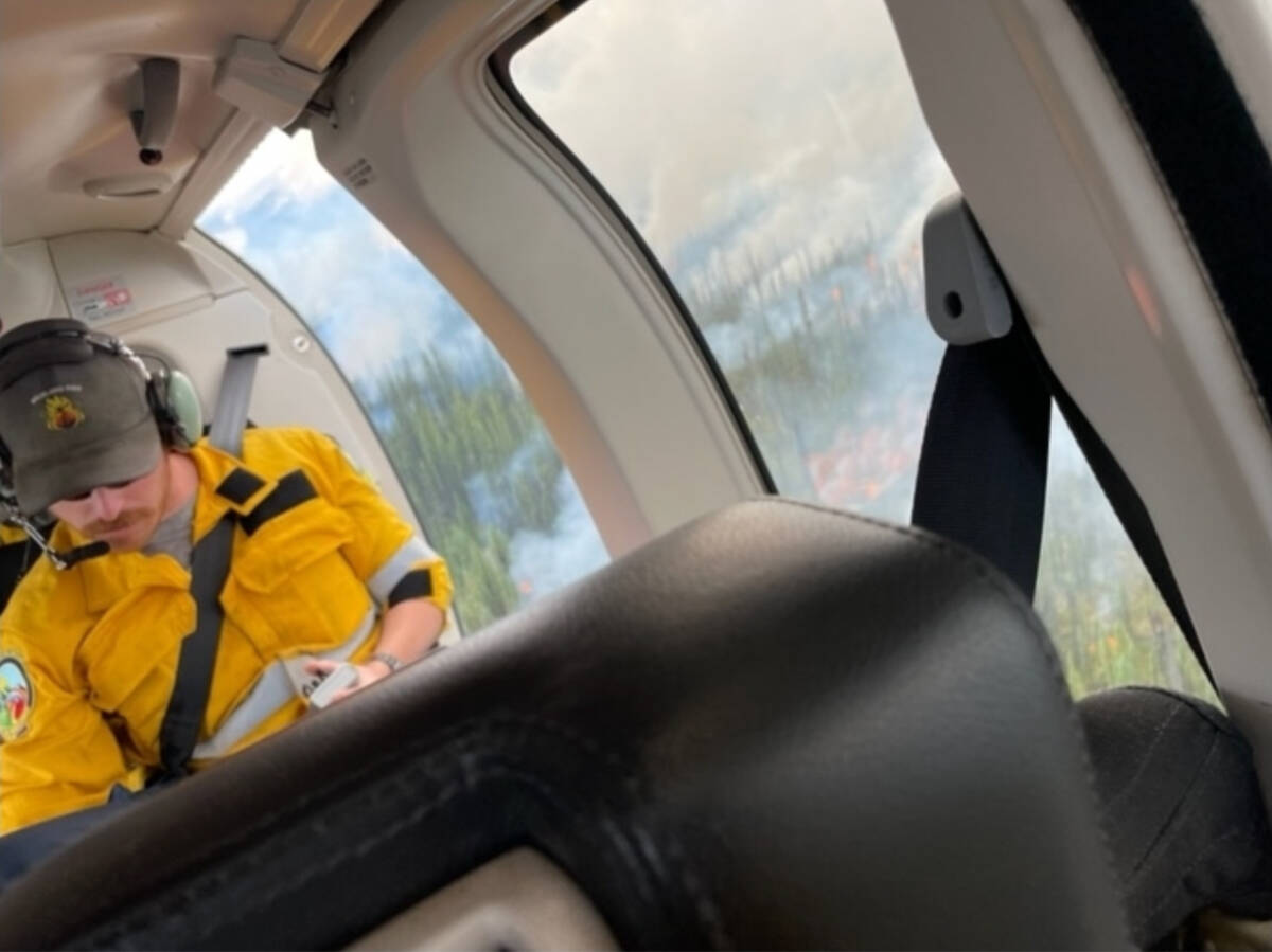 A crew flew over the Frances Lake fire on July 5. Yukon Wildland Fire Management has a $21.8-million budget that could go up given the historic fire season. (Yukon Wildland Fire Management/Submitted)