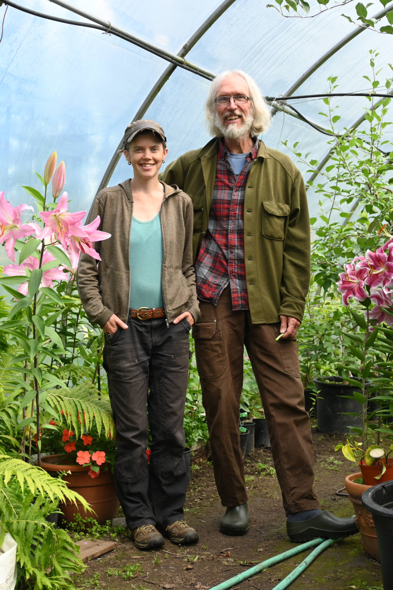 John Lenart and Kim Melton are awarded for growing fruit trees in unlikely conditions at Klondike Valley Nursery. (Courtesy/Kate Lawless)