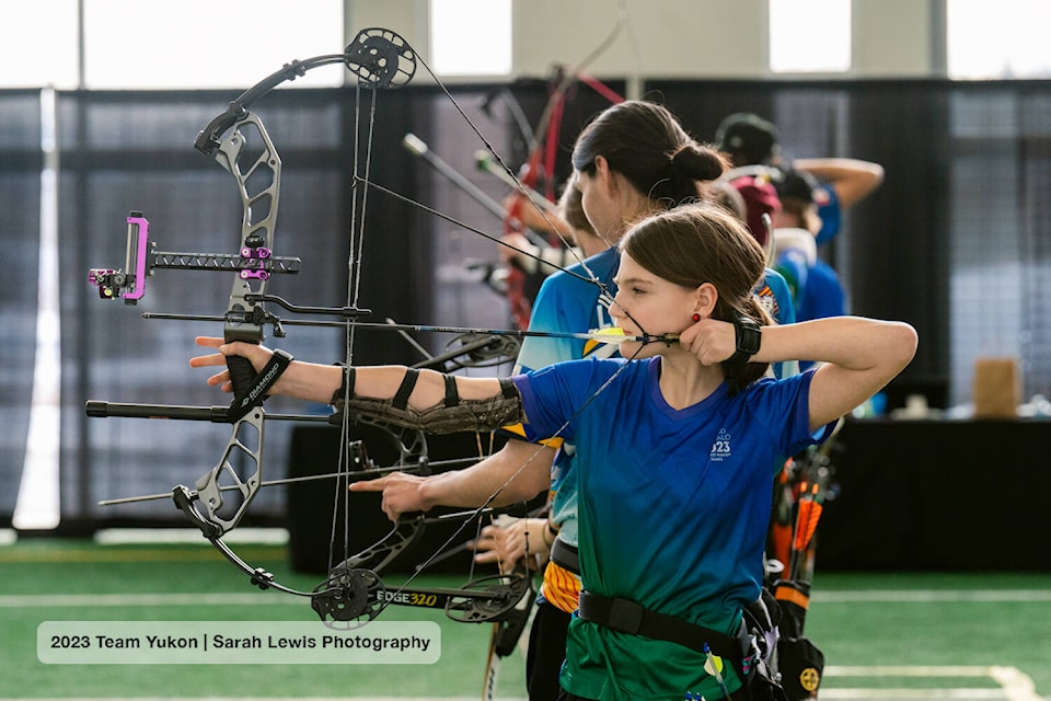 Riley Cyre practises for Yukon’s archery team at the Arctic Winter Games in Wood Buffalo, Alta., on Jan. 30. The Yukon’s two compound archery teams won gold and bronze on Jan. 31. The barebow squad earned silver. (Sarah Lewis/Team Yukon)