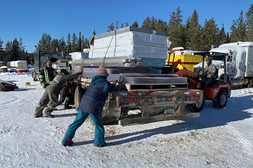 A brand-new passive solar greenhouse arrived as a kit to Sarah’s Harvest on March 8. (Ray Marnoch/Sarah’s Harvest)