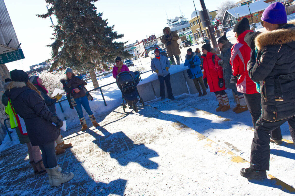 About 20 attendees listen to remarks at an International Womens Day gathering on March 8. (Gabrielle Plonka/Yukon News)
