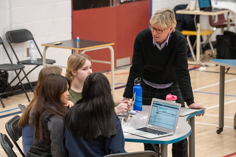 Mayor Laura Cabott chats with students during the coding event in Whitehose on March 28. (Courtesy/Your Voice is Power)