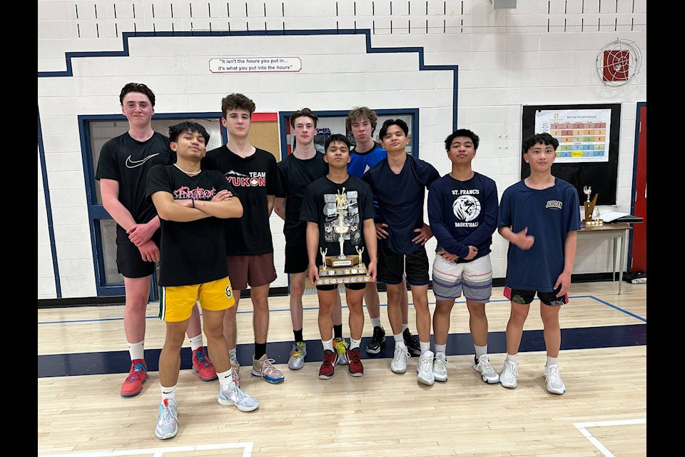 Grade 8 to 12 players hold a trophy after winning the weekly tournament. (Courtesy/Sean McCarron)
