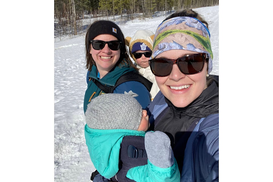 MacKenzie Litster (left) and Jenna McDowell take a business meeting outdoors while both on parental leave. (Submitted)